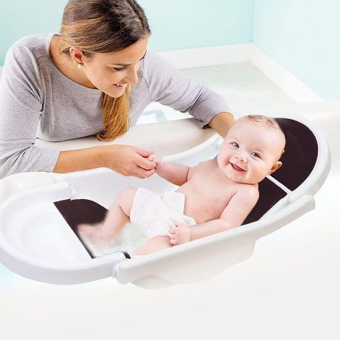SUNBABY "Pure Love Foldable Baby Bather" Inclined Anti-Slip Foam for Body & Head Support, Plastic Bath Baby Shower, Plug for Water Drainage, Easy Dry, Foldable, Age 0-6 Month (White-Black)